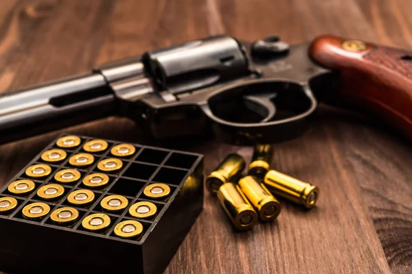 Revolver Cartridges Wooden Table — Stock Photo, Image