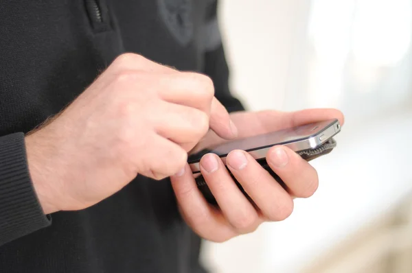 Man hold phone in hands and typing, chatting — Stock Photo, Image