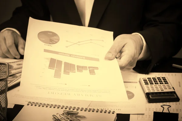 Man Analysis Business and financial report.