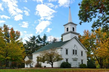 Rural church in New England countryside clipart