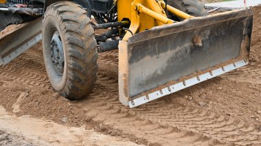 Yol için buldozer seviyeleri. Yüksek kalite fotoğraf