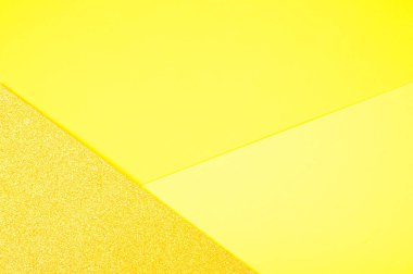 Soyut kağıt geometrik arkaplan sarı tonlarda. 2021 yılının rengi aydınlatıcı. Yüksek kalite fotoğraf