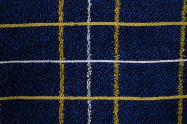 Beyaz sarı çizgili koyu mavi kumaş. Yüksek kalite fotoğraf