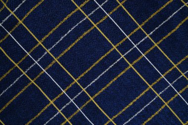 Beyaz sarı çizgili koyu mavi kumaş. Yüksek kalite fotoğraf