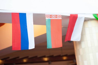 Russian, Belarusian and Polish flags.  clipart
