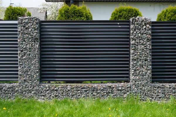 New build gabions fence. Gabion fence.