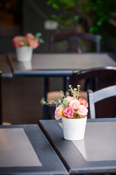 Roes and other flower are arrange in white bucket. Stock Picture