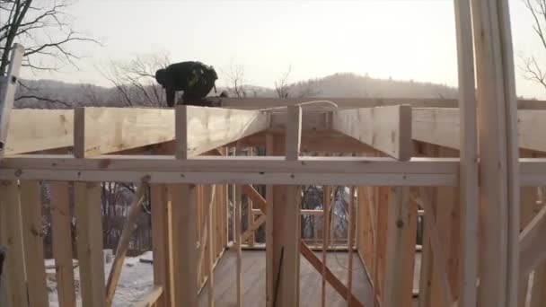 Builders Working Unfinished Frame House Interior Wooden Beams Roof Walls — Stock Video