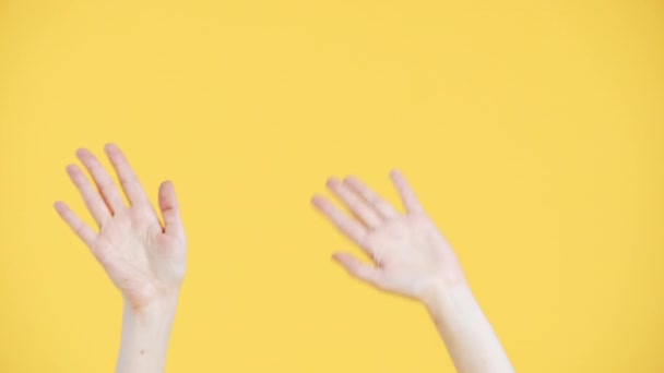Female Hands Dancing Waving Palms Pointing Fingers Gesture Yellow Background — Stock Video