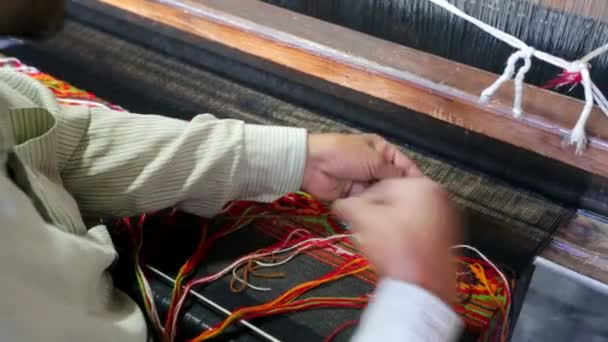 Weaver working handloom at workshop — Stock Video