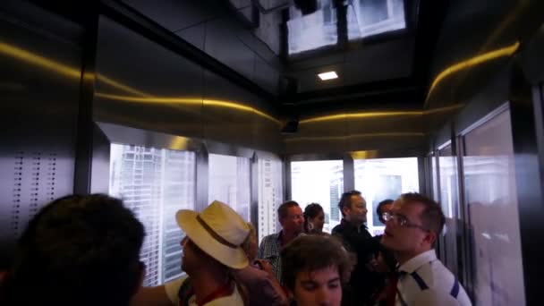 Tourists in an elevator lift — Stock Video