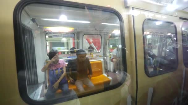 People ride in monorail train — Stock Video