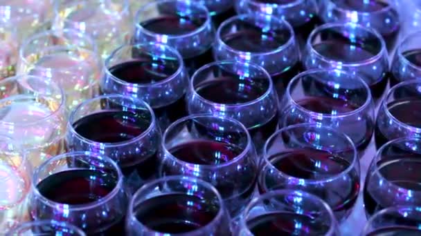 Stemware with red and white wine — Stock Video