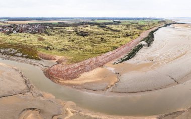 İkinci Dünya Savaşı sırasında yıkılan eski binaların kalıntılarının, Hightown 'daki Sefton kıyısında, Alt Nehri' nin yanında bulunan çok görüntülü bir panorama..