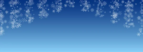 Witte sneeuwval vector blauwe achtergrond. Kerstmis — Stockvector