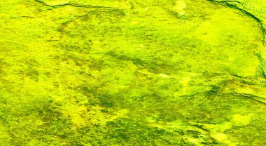 Soyut grunge. Sarı duvar dekoratif arka plan. Metnin için alanı olan pürüzlü biçimlendirilmiş pankart dokusu.