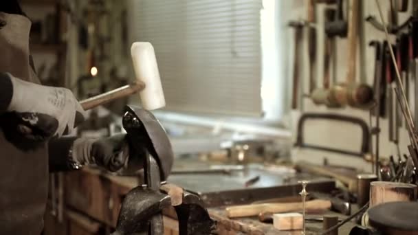 Portrait Master goldsmith working in his workshop — Stock Video