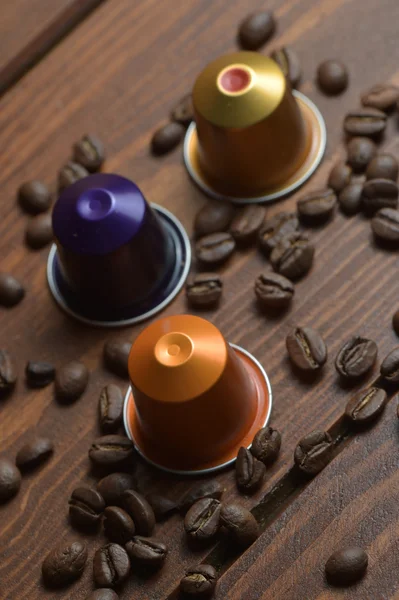 Haricots et capsules de café — Photo