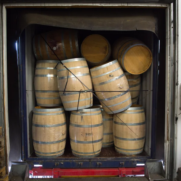 Wine barrels stacked in Truck ,Loading dock, Bordeaux Vineyard — Stock Photo, Image