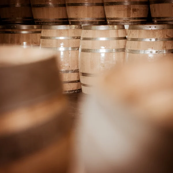 Winemaker barrels moving up or down by rolling on ground — Stock Photo, Image