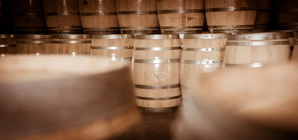 Wine barrels stacked in cellar, Bordeaux Vineyard — Stock Photo, Image