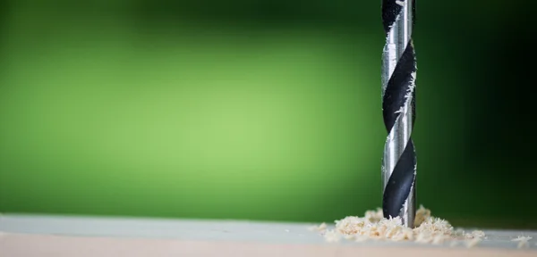 Close up de broca em madeira — Fotografia de Stock