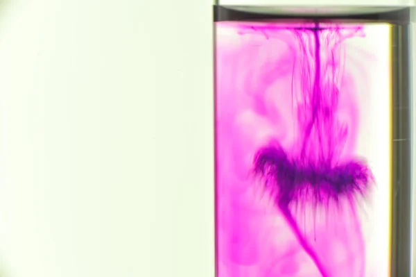 Potassium permanganate fall in water in test tube