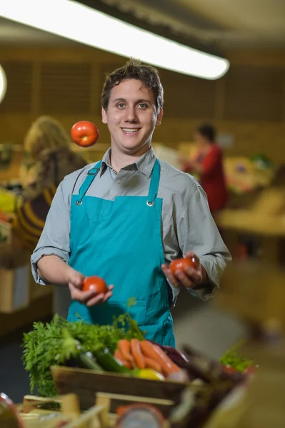 https://st2.depositphotos.com/2321719/11879/i/450/depositphotos_118790014-stock-photo-grocery-clerk-juggling-with-tomatoes.jpg