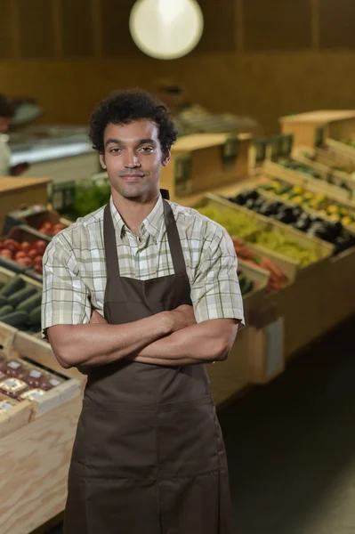 Portrait of Grocery clerk working in supermarket store — Stock Photo, Image