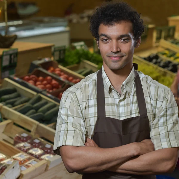 Portrait of Grocery clerk working in supermarket store — Stock Photo, Image