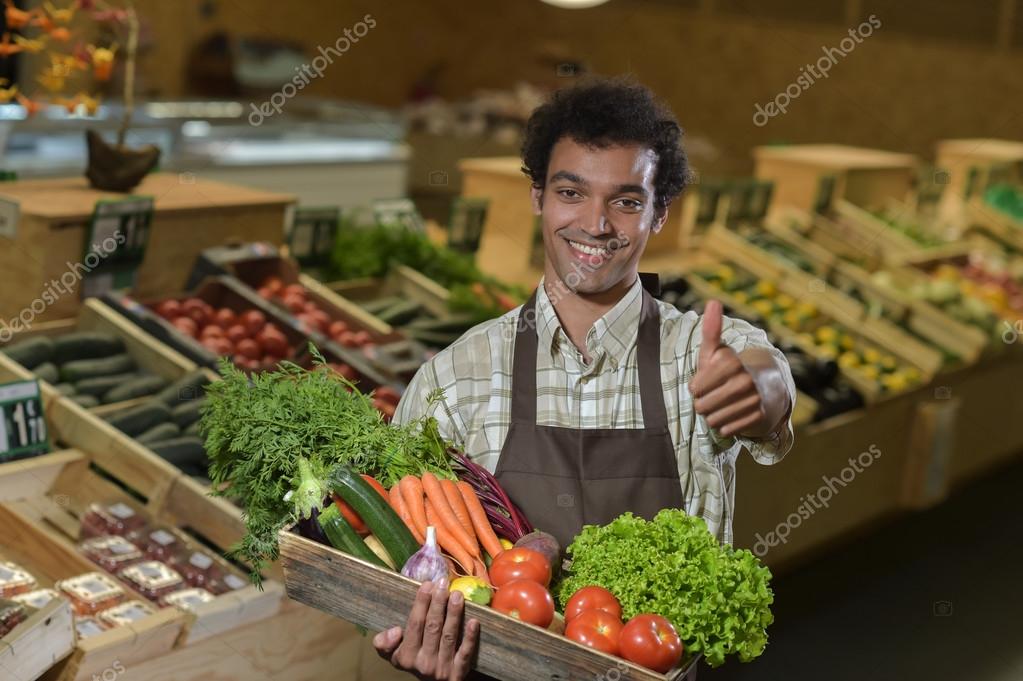 https://st2.depositphotos.com/2321719/11879/i/950/depositphotos_118794062-stock-photo-grocery-clerk-working-in-produce.jpg