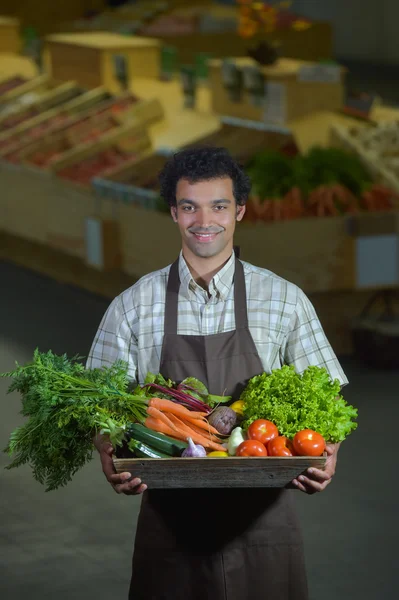 Portrait of Grocery clerk working in supermarket store — Stock Photo, Image