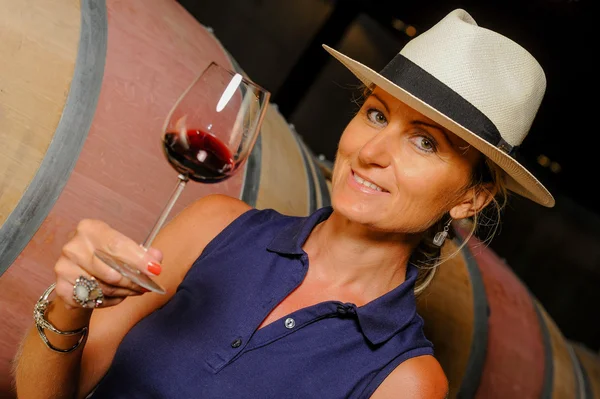 Tourism - Man tasting wine in a cellar-Winemaker — Stock Photo, Image