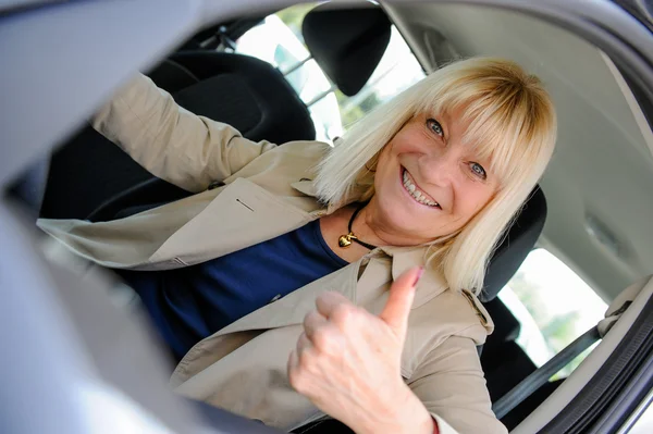 Senior woman happy At the Wheel — Stock Photo, Image