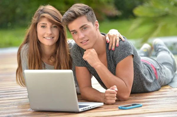 Young couple making purchases on Internet — Stock Photo, Image