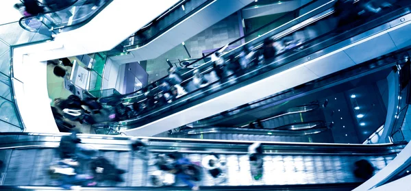 People on crossing Escalators — Stock Photo, Image