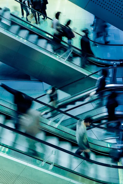 People on crossing Escalators — Stock Photo, Image