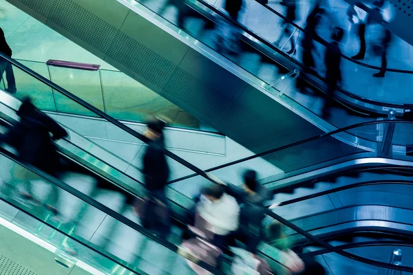 People on crossing Escalators — Stock Photo, Image