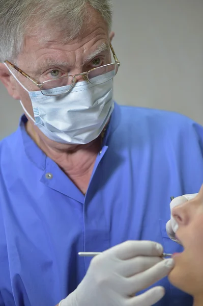 Portrait Dentist in action — Stock Photo, Image