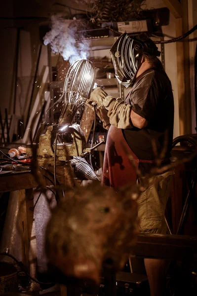 Metal worker standing in workshop — Stock Photo, Image