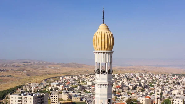 Mosque Tower minaret With Speakers in JerusalemBeautiful Drone footage with Jordan desert mountain, Shuafat, Jeusalem