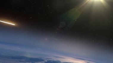 Göktaşı Dünya atmosferine giriyor. Göktaşının dünya mavi atmosferine girerken alevler içinde yanan gerçekçi görüntüsü.