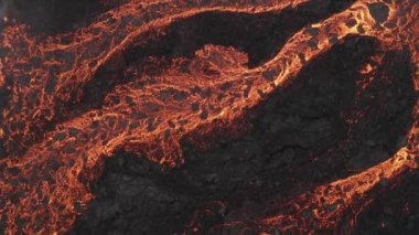 Lava Flows on active volcano aerial view, Mount Fagradalsfjall, Iceland4K drone shot from Iceland of Hot lava and magma coming out of the crater, April 2021 
