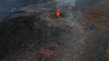 Lava Flows on active volcano aerial view, Mount Fagradalsfjall, Iceland4K drone shot from Iceland of Hot lava and magma coming out of the crater, April 2021 