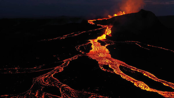 Aerial view over volcanic eruption, Night view, Mount Fagradalsfjall4K drone shot of lava spill out of the crater  Mount Fagradalsfjall, September 2021, Iceland 