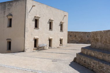 Interior view of the Castle of Santa Catalina in Cadiz, Andalusia, Spain. Ancient seaside fortress with stone walls and sunny courtyards, symbol of Spanish maritime and military history. Perfect image for concepts of tourism, heritage, architecture, 