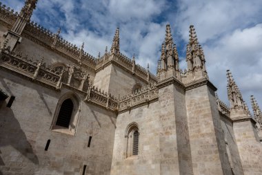 View of the majestic Cathedral of Granada, located in the heart of the Andalusian city. A remarkable example of Spanish Renaissance architecture with Baroque details. Perfect image for concepts of faith, history, art, religion, and cultural tourism 