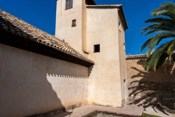 Exterior view of the Palacio de Dar al-Horra in Granada, Spain, a historic Nasrid-era palace featuring Moorish architecture. Perfect image for concepts of history, culture, architecture, and Andalusian tourism.