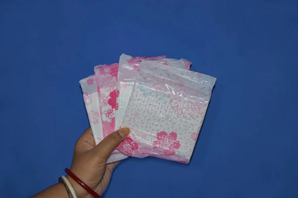 Female Hygiene Products Woman Hand Holding Stack Sanitary Napkins White — Stock Photo, Image