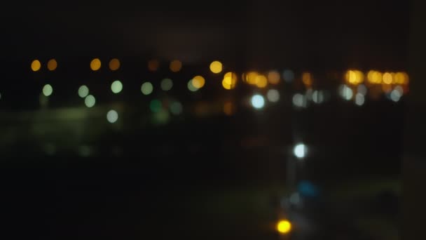 Sfondo Sfocato Della Città Notturna Lanterne Vista Dalla Finestra — Video Stock